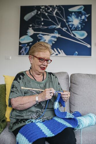 Resident of Cherry Tree Grove Retirement Village Di Pullin Knitting a Scarf, Croydon, Victoria, 22 Mar 2021