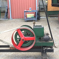 Close up of engine mounted on trolley frame.