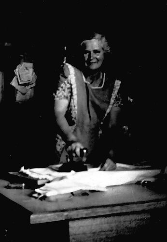 [Eliza Bannan ironing shirts, Separation Street, Fairfield, 1946.]