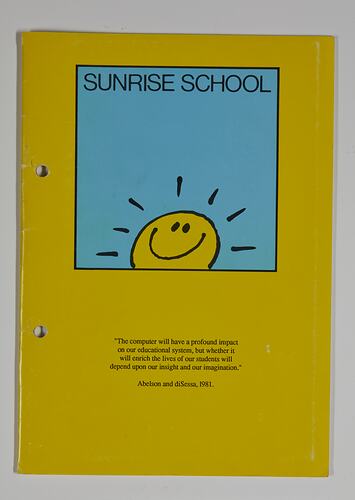 Yellow booklet cover with blue square featuring yellow smiling 'sunshine' face. Black printed text above/below