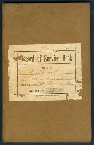 Brown book cover with tattered label on front with printed and written text.