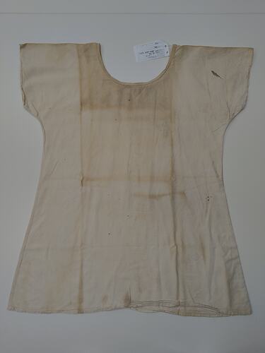 Short sleeve white dress. Stained.