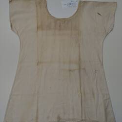 Short sleeve white dress. Stained.