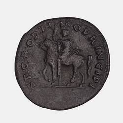 Round coin with figure on horse holding a spear and small Victory figure, advancing left. Text around.