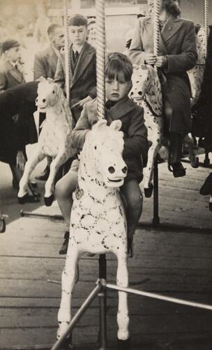 Digital Photograph - Boy Riding Merry Go Round at Luna Park, St Kilda, 1940-1949