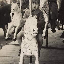 Digital Photograph - Boy Riding Merry Go Round at Luna Park, St Kilda, 1940-1949