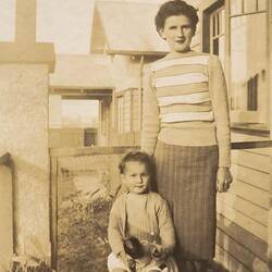 Digital Photograph - 'Not More Snaps Mummy', Mother & Daughter on Front Verandah, Preston East, 1946
