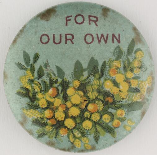 Round badge with yellow wattle image.