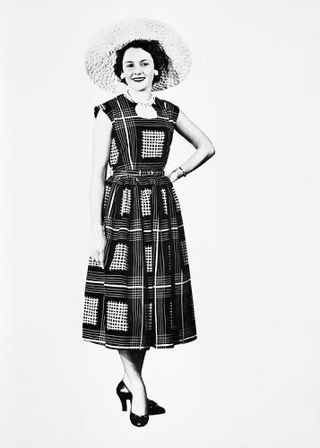 Emily McPherson College, Model Wearing Dress and Hat