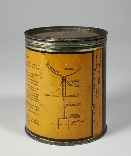 Side view of can with printed yellow label.