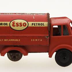 Red toy 'motor oil' truck, right view.