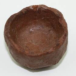 Toy bowl made from clay, viewed from above.