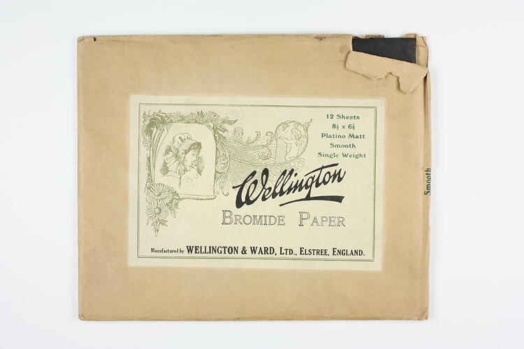 Brown paper packet with illustrated label.
