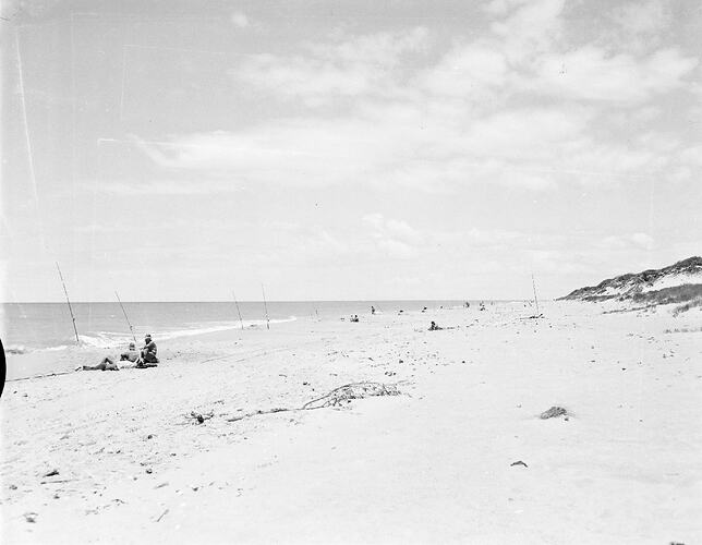 Monochrome photograph of a fishing competition.