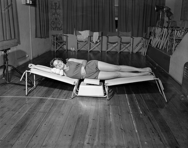 Elly Lukas Salon, Woman Lying on a Exercise Machine, Melbourne, 23 Feb 1960