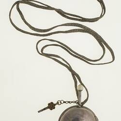 Gentleman's pocket watch in case and attached to silver plaited chain.
