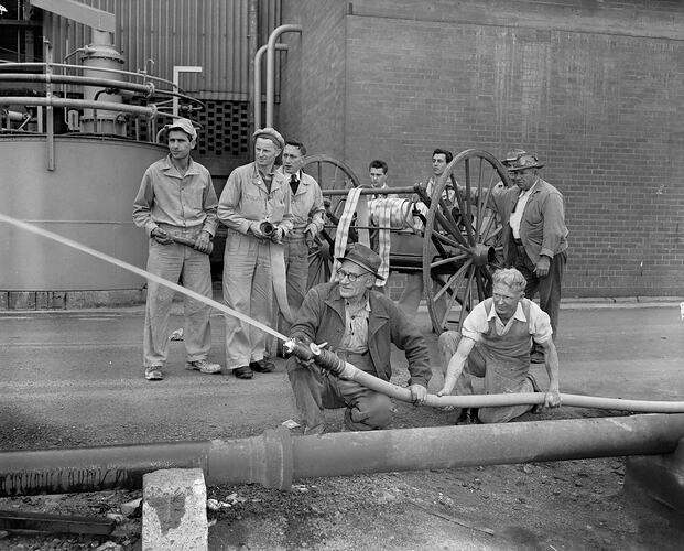 Men with Fire Hose and Reel, Melbourne, Victoria, 1956