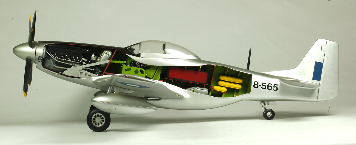Silver model aeroplane. No left side panel to reveal internal parts.