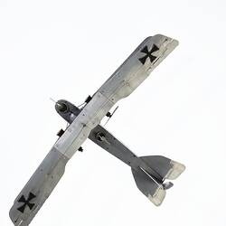 Model of a bi-plane made mostly of aluminium sheet metal.