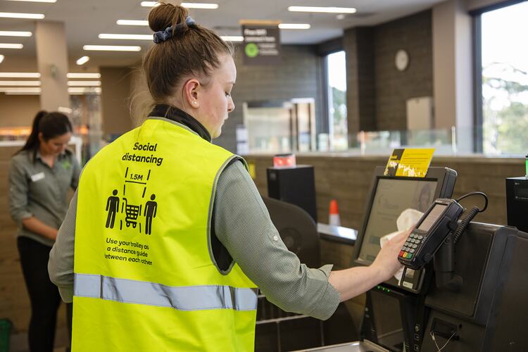 Staff Member Sanitising Self-Checkout Touchscreen, Woolworths, Blackburn South, 18 May 2020