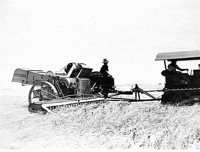 12 FT H.S.T. HEADER WITH POWER TAKE OFF & FITTED WITH CANADIAN LIFTERS IN CROP AFTER SEVERE HAIL STORM.