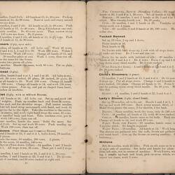 Open booklet with off-white pages and black printed text.