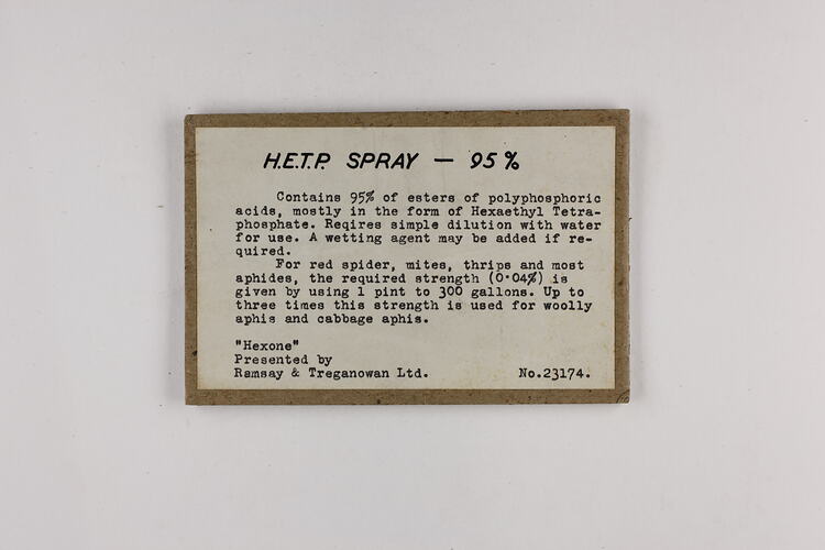 White rectangular label with black text and brown border.