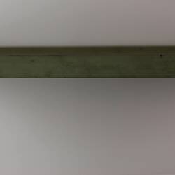 View from above of thin exhibition label.