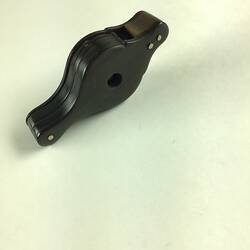 Black loupe, closed. Two round hinged magnifying glasses have be slid into the case.