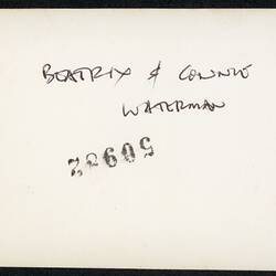White back of photograph with handwriting.