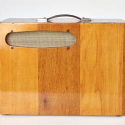 Side view of rectangular wooden box with one horizontal slat near top and handle on top.