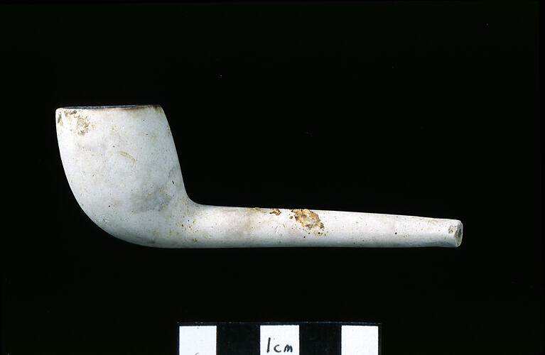 White clay tobacco pipe. Bowl and stem.