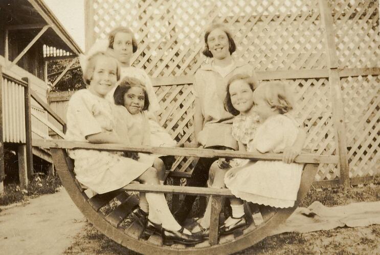 Digital Photograph - 6 Girls Playing in Handmade Wooden Rocker, Camberwell, 1925