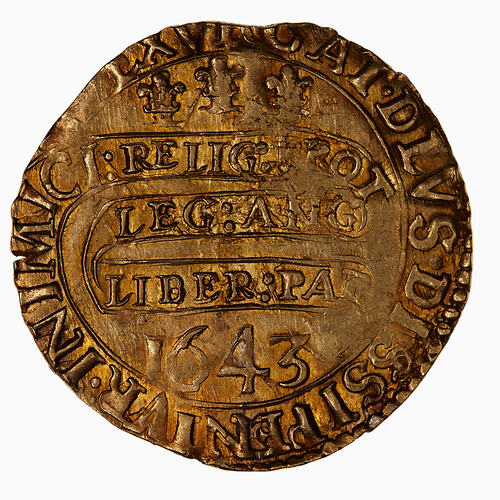 Coin, round, at centre within a beaded circle, three plumes; below on a continuous scroll text in three lines.