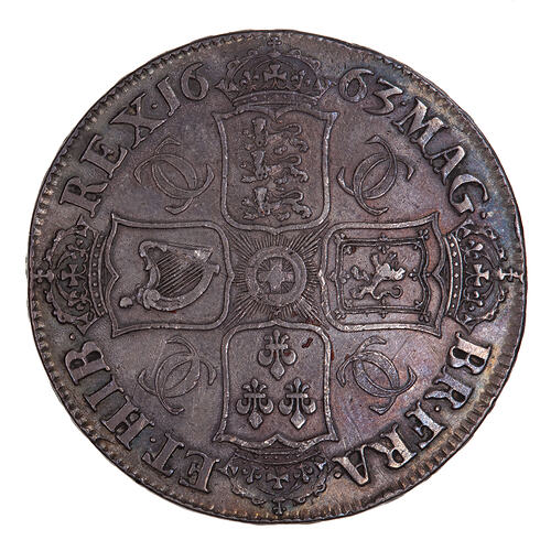 Coin, round, four crowned shields bearing the arms of England, Scotland, France and Ireland; text around.