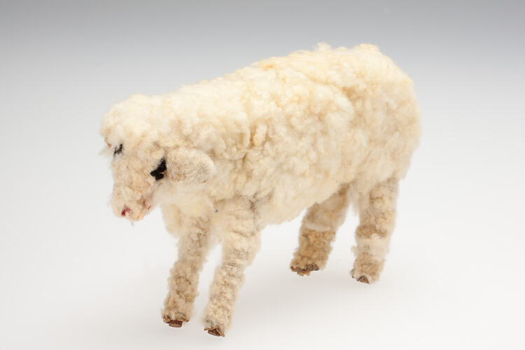 Handmade toy sheep in real wool.