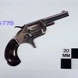 Small pocket rimfire revolver.