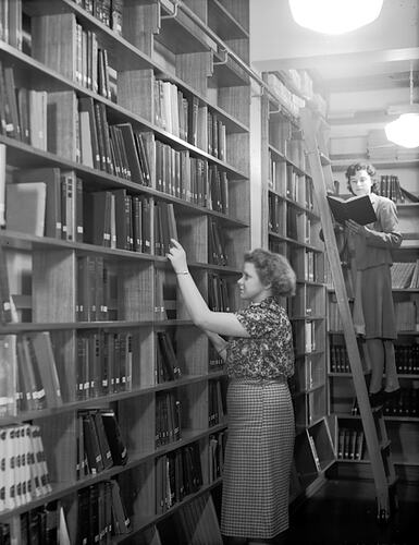 [Working in the technical library of the State Electricity Commission head office, William Street, Melbourne, December 1946.]