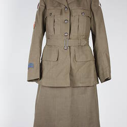 Khaki female army uniform, belted jacket and skirt.