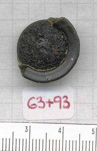 Button with 1/2Flange-shaped tektite.
