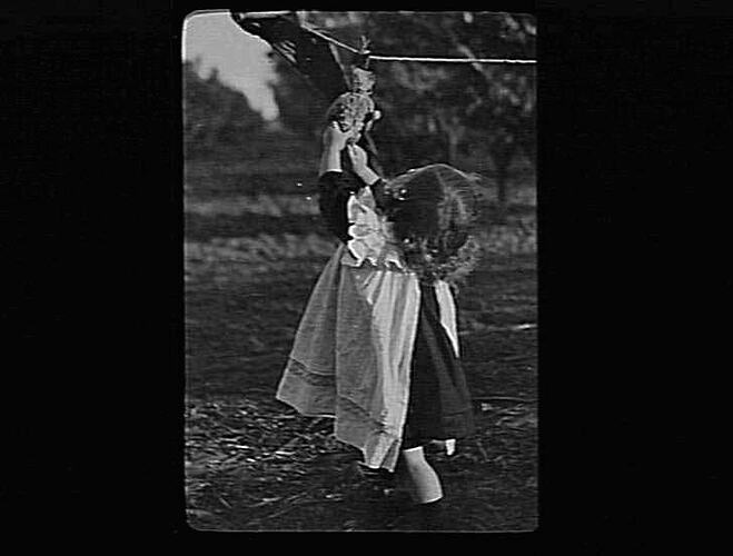 MERRIGUM - DOROTHY PITTS PLAYING WITH TOY AND CLOTHES LINE