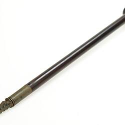 Wood and brass revolver cleaning rod. Textured brass tip.