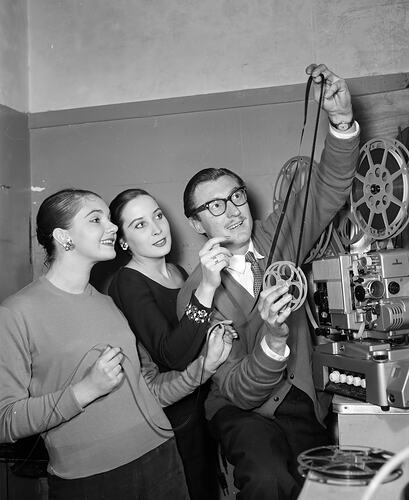 People with Film & Projectors, Melbourne, Victoria, Jul 1958
