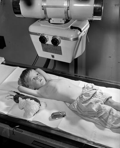 Royal Children's Hospital, Boy Lying on a Clinical Bed, Carlton, Victoria, 11 May 1959