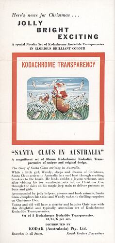 White leaflet with printed text and colourful image of Santa Claus in a boat surfing a wave.