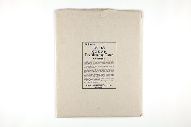 Brown paper packet printed with blue text.