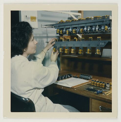Slide 246, 'Extra Prints of Coburg Lecture', Worker Clipping Films Onto Rack, Building 20, Kodak Factory, Coburg, circa 1960s