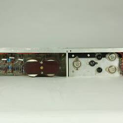 Side view of open metal box. Case removed to show internal wires and components.