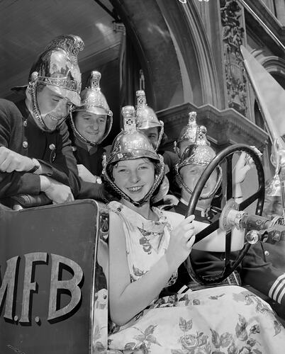 Woman with Firemen, Melbourne, Victoria, Feb 1959