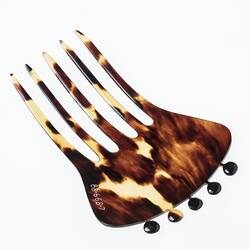 Tortoiseshell hair comb, five tines and knobs on base.